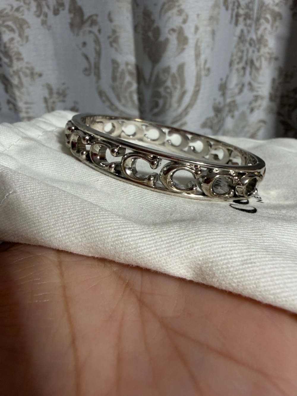 Coach Silver-Tone Cutout C Signature Bangle Bracelet